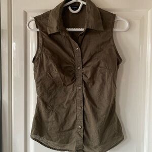 Sleeveless earthy green button up blouse with delicate flower embroidery